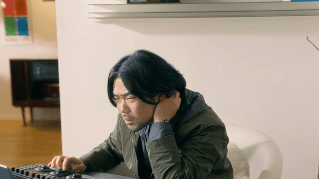 Man working on a computer indoors