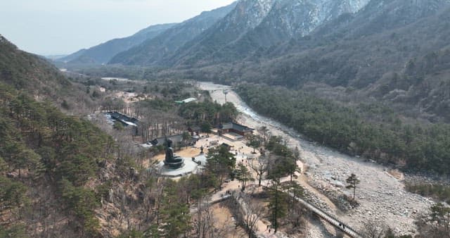 Aerial View of a Temple in the Mountain Valley