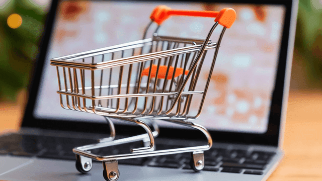 Shopping cart on a laptop keyboard