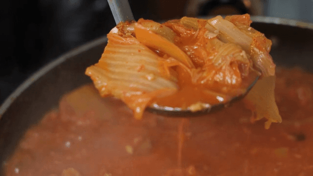 Kimchi jjigae boiling in a pot
