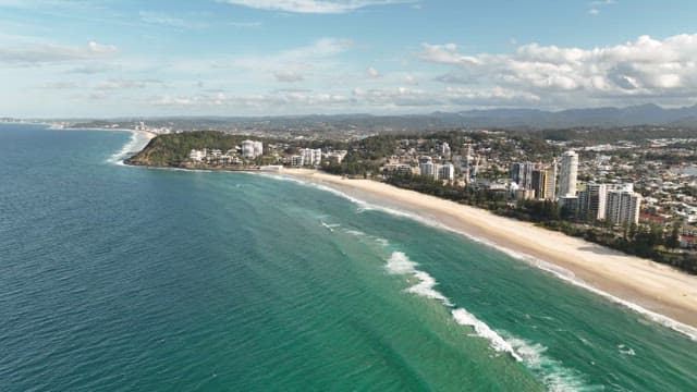 Coastal Cityscape with Beach and Buildings