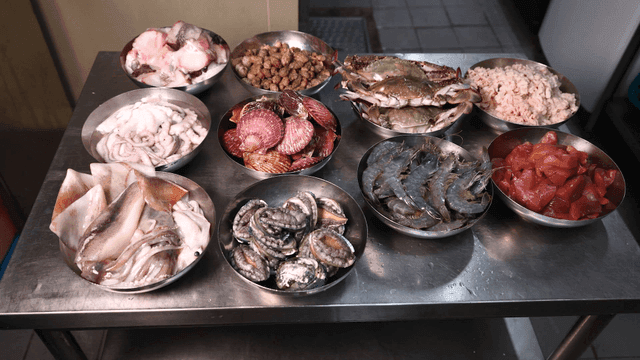 Various seafood displayed on a table
