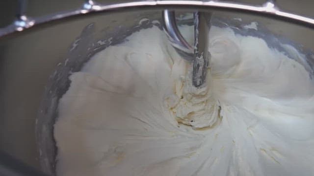 Dough being prepared in a machine of factory kitchen