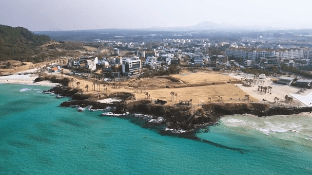 Coastal village with turquoise waters
