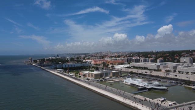 Crowded Riverside and Urban Landscape with Densw Buildings