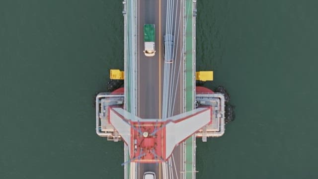 Cars driving on a bridge over water