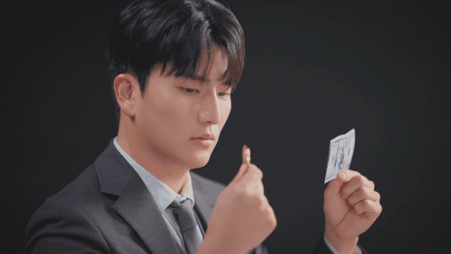 Man comparing Bitcoin and US dollars