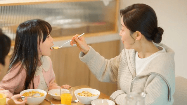 Family enjoying breakfast together