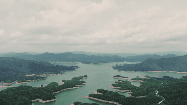 Vast lake surrounded by lush mountains