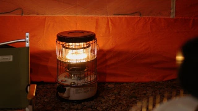 Illuminated heater lights up the orange tent