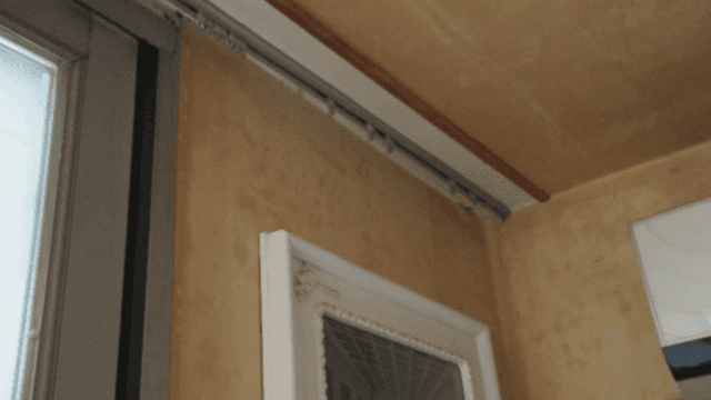 Interior view of a window and wall corner