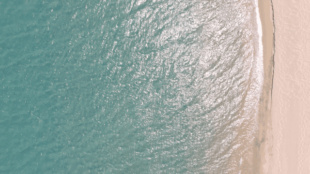 A serene beach with gentle waves