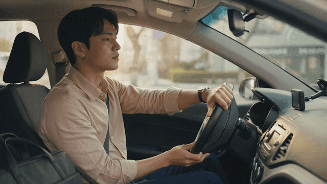 Man driving car on road