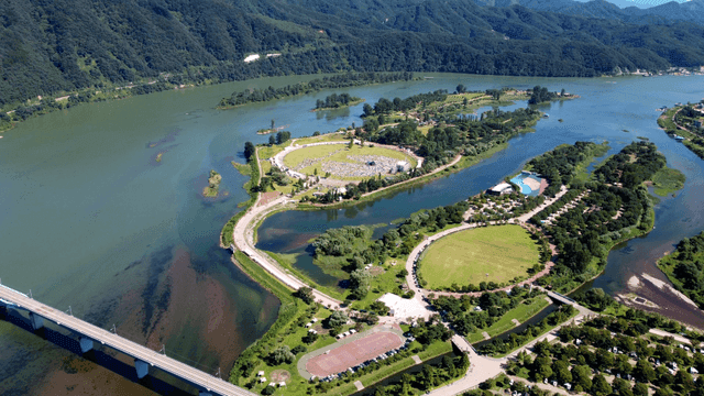 Scenic river with bridges and lush greenery