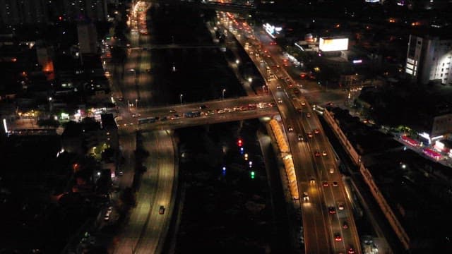 Night Market Bustling with Activity Overhead View