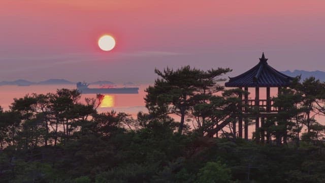 Sunset view with an old pavilion