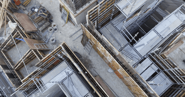 Construction site with workers in helmets