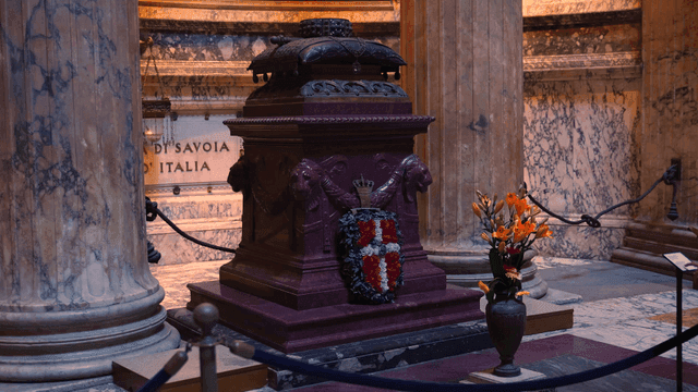 Decorative tomb inside a marble hall