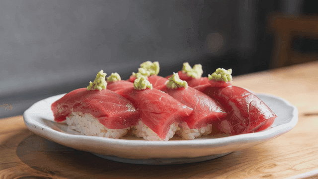 Fresh tuna sushi topped with wasabi