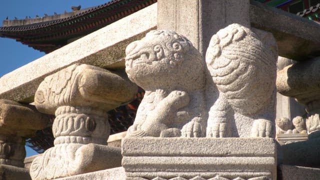 Haetae stone statue on the stone railing of Gyeongbokgung Palace