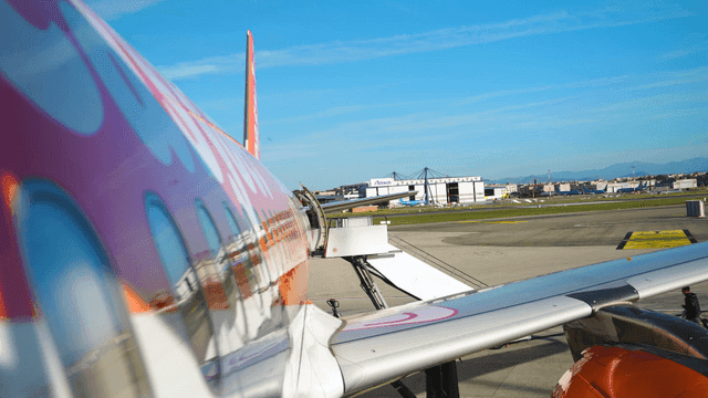 Airplane parked at the airport terminal