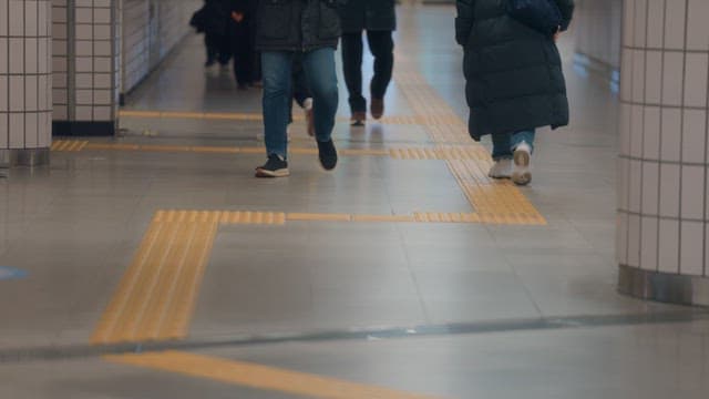 People walking in a subway station