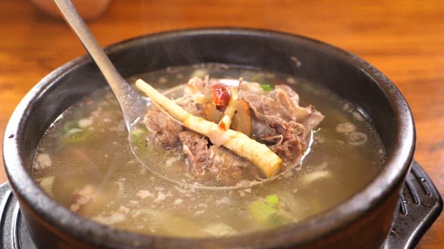 Hearty bowl of galbitang full of nutrients and various ingredients