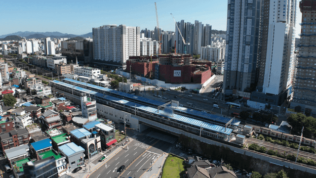 Bustling city with a train station