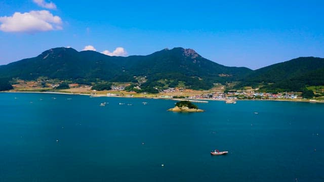 Tranquil Coastal Village by the Mountain