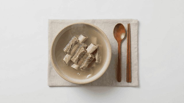 Bowl with galbitang and chopsticks