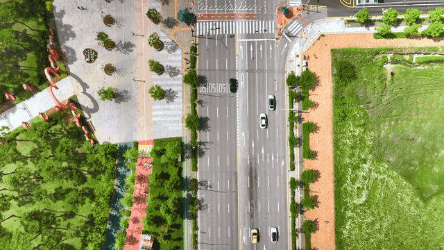 Aerial view of a city intersection with traffic