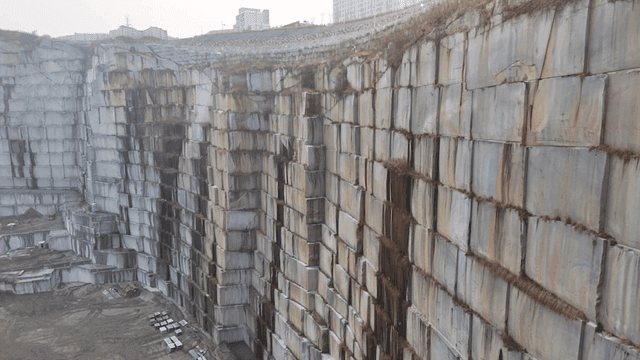 Large stone quarry with stacked blocks