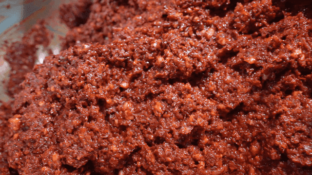 Sight of chili sauce mixing in bowl