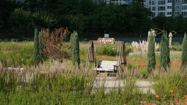 Garden with swing and flowers