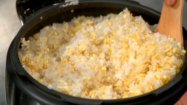 Well-made sweet rice being stirred