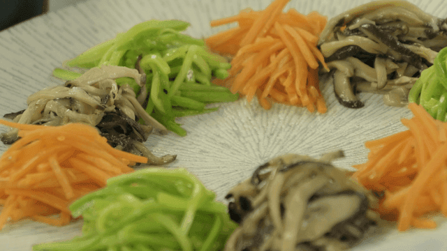 Colorful vegetables and mushrooms on a plate