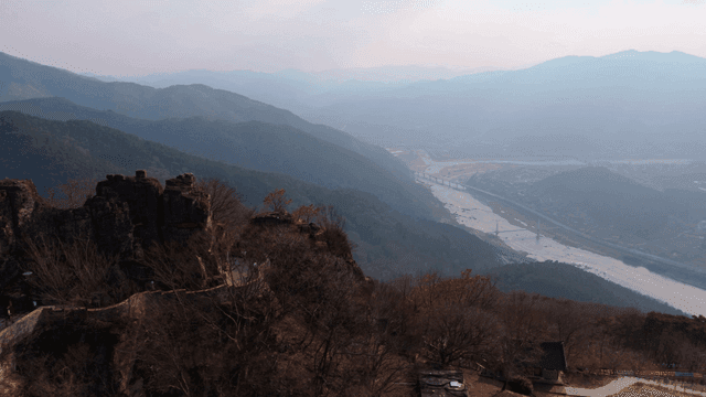 Mountainous landscape with distant river