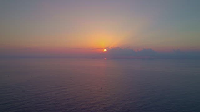 Sunset over a calm ocean