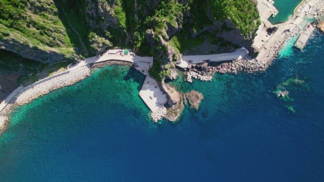 Coastal road and clear blue sea