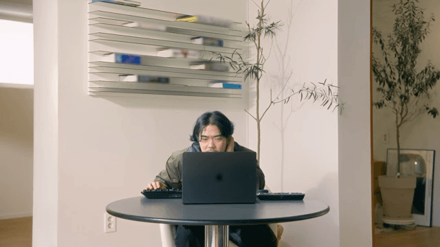 Man working on a laptop at a desk