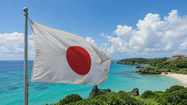Japanese flag waving by a scenic beach
