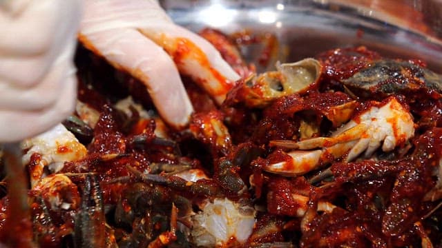 Spicy red marinated crab