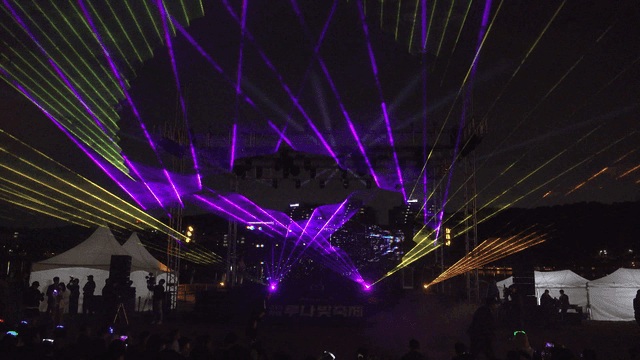 Night laser show with vibrant lights