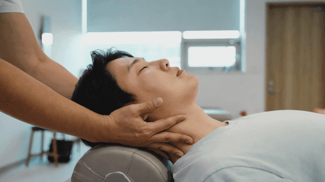 Person receiving neck massage