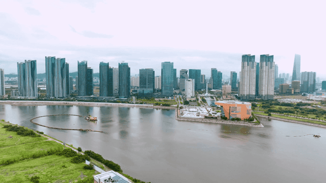 Modern city skyline with river view