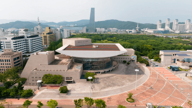 Modern cityscape with green surroundings
