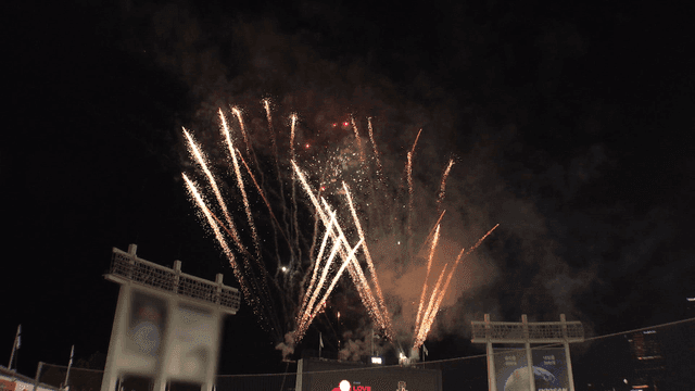 Fireworks over baseball stadium at night