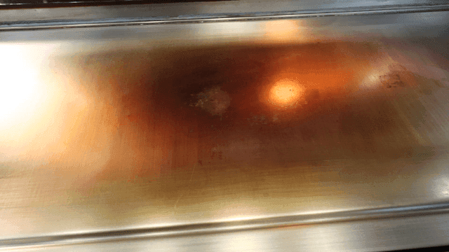 Clean griddle with spatula