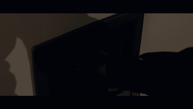 Person taking out coffee from vending machine