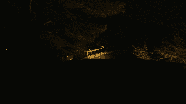 Traditional Korean pavilion at night